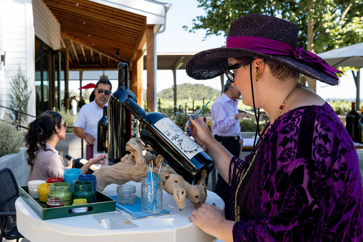 Bespoke by Bergin image 2 lady checking out wine bottle